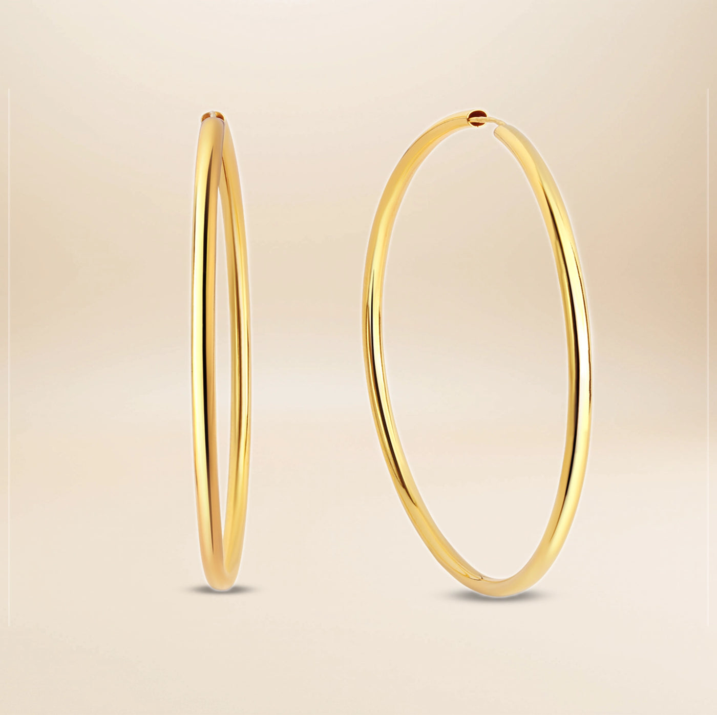 Noelle Creolen – vergoldetes 925er Silber